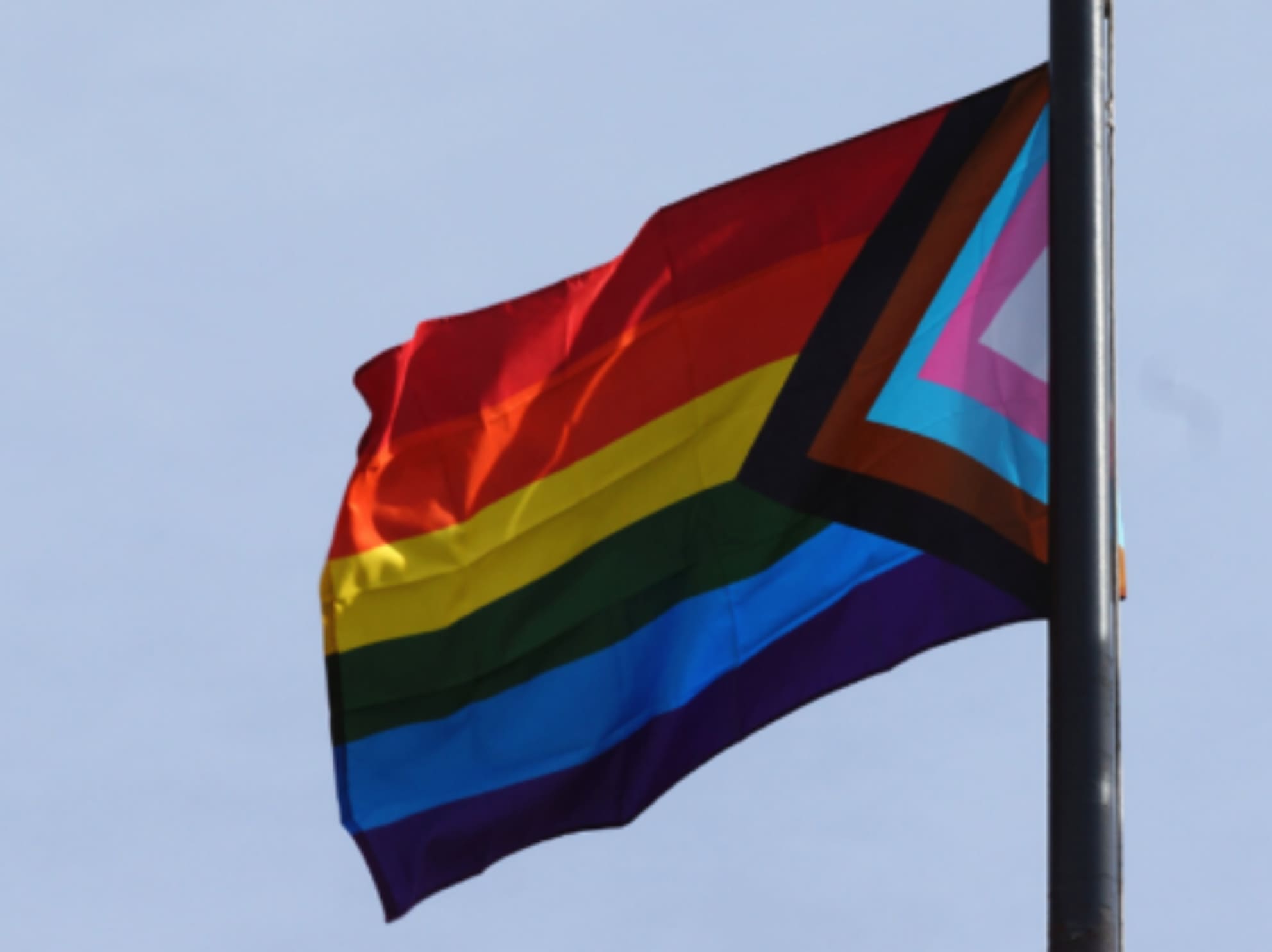 Pride flag blowing in wind
